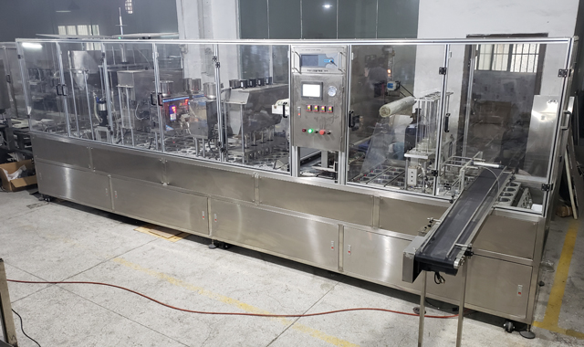 Linear type vacuum sealing cups machine.jpg