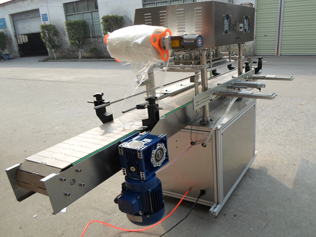 model YX-FS30A jars sealing machine.jpg