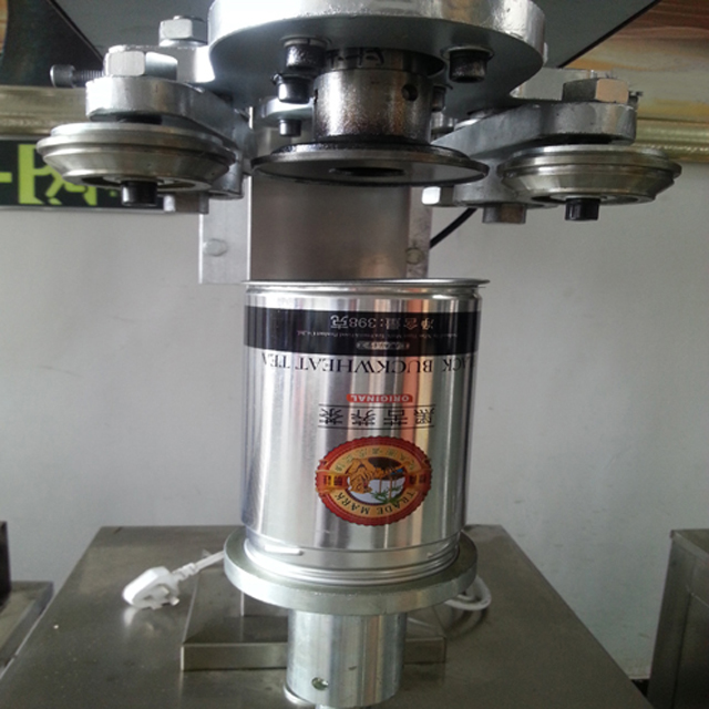 beer tins sealing machine.jpg